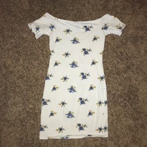 White skin tight dress with blue flowers